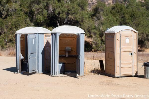 a clean row of portable restrooms for outdoor weddings or festivals in Jennings, FL